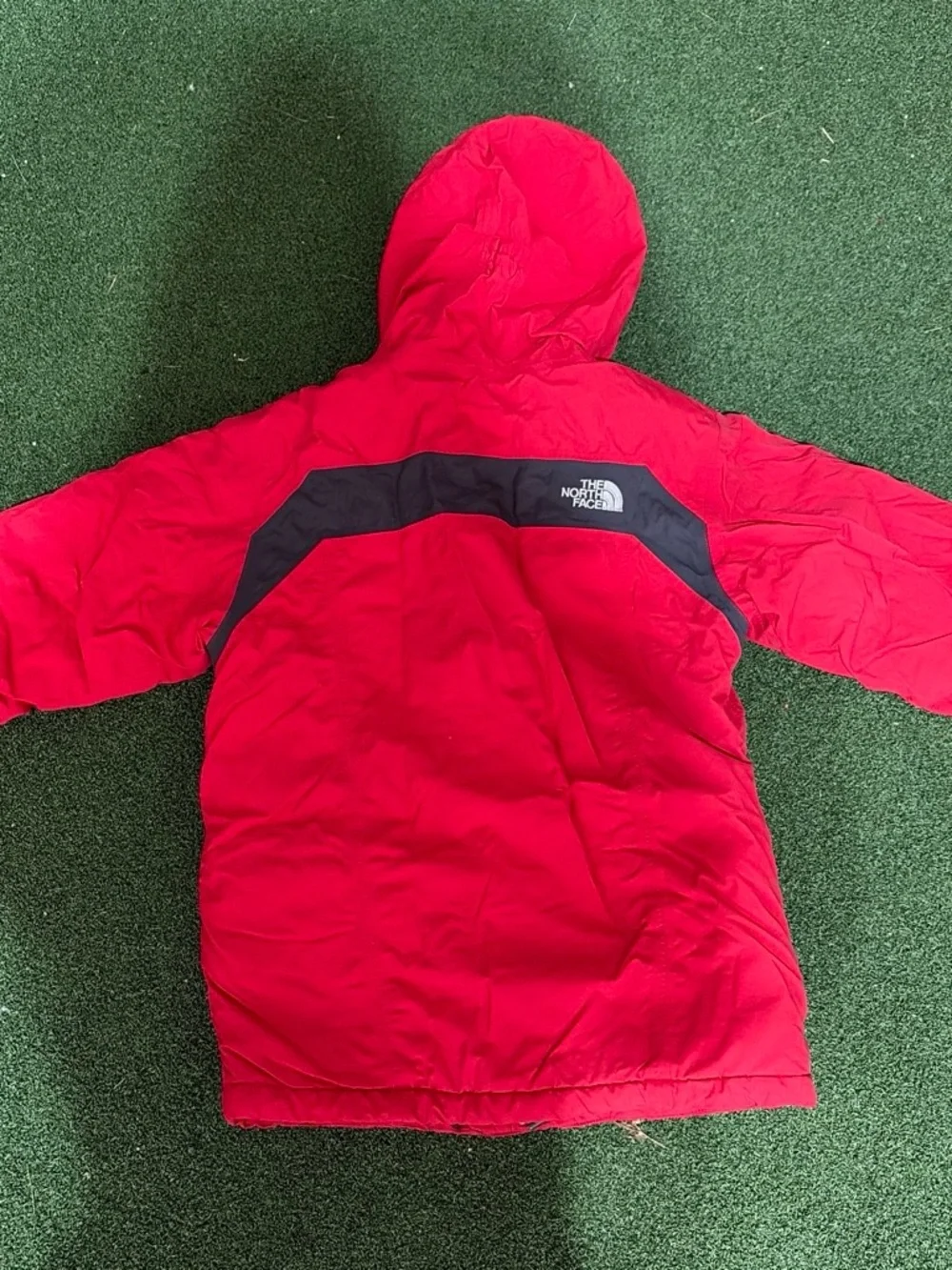 The North Face Kids Red Hooded Puffer Jacket with Black Accents
